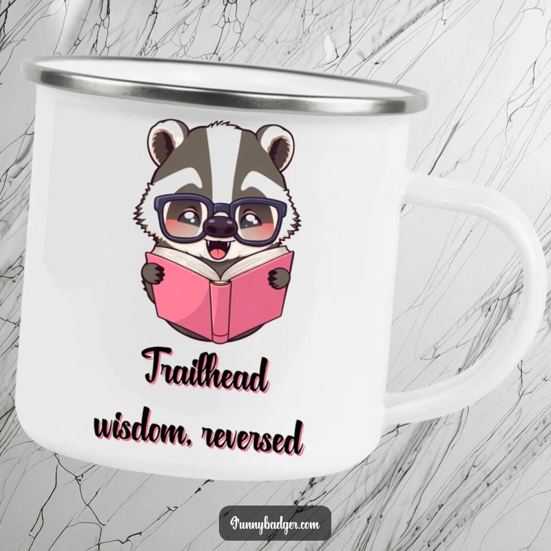 Funny camping mug depicting a badger with large glasses reading a book upside down, suitable for outdoor adventures.